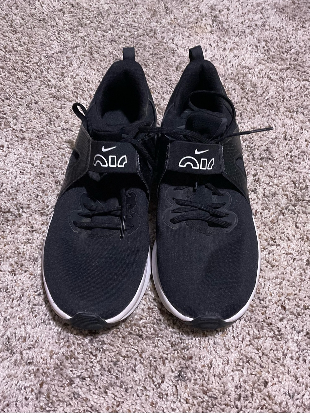Nike Women's Black and White Slip-On Training Sneakers with Strap